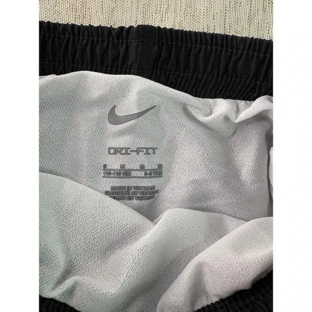 Three pairs of kids Nike dri fit short size 6